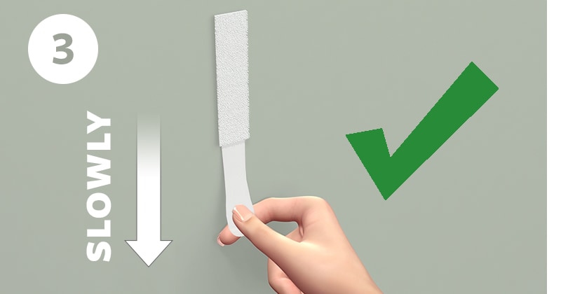 Step 3 of removing command strips
