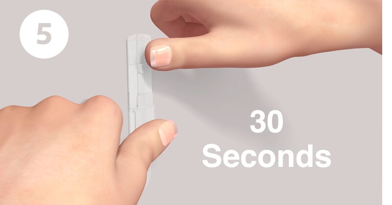 Step 5 of how to apply command hooks: press base firmly for 30 seconds
