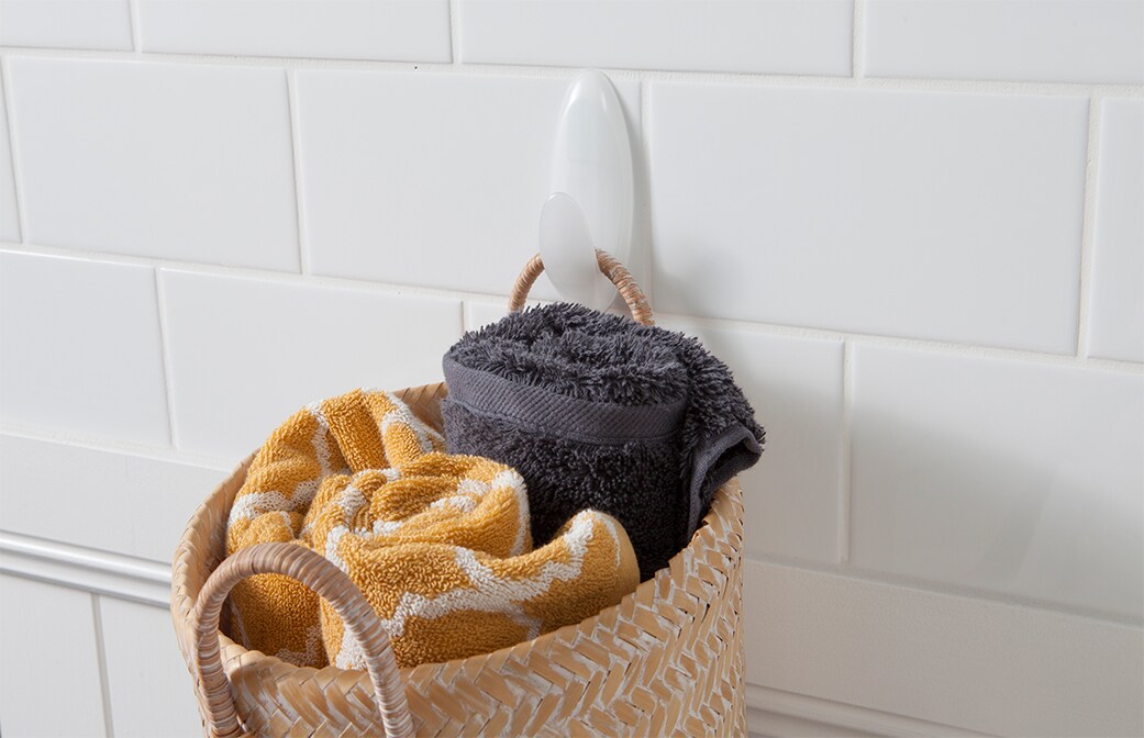 image of a command wall  hooks in the wet & dry range used to hang towels in a basket 